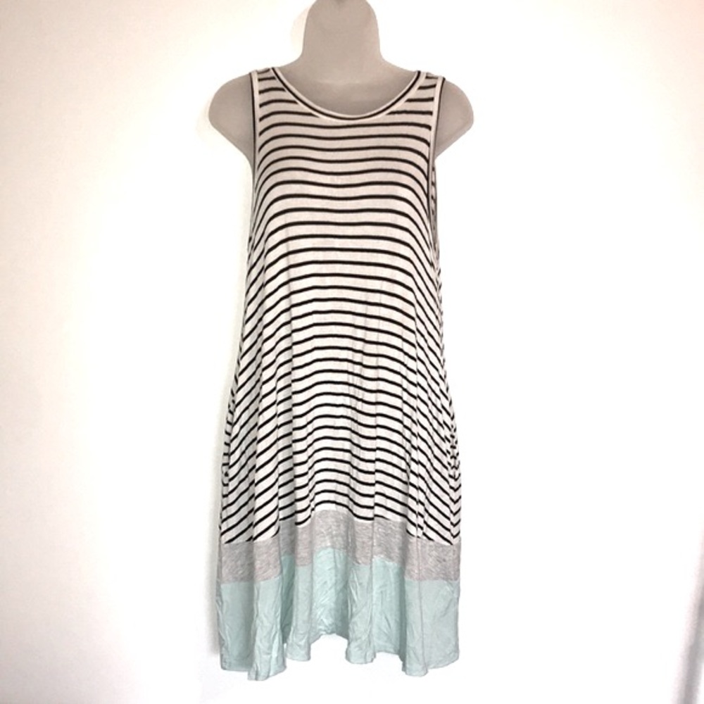 Reborn J sleeveless dress with pockets.